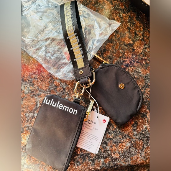 lululemon athletica Handbags - lululemon✨🖤💛Black and Gold Wristlet Set